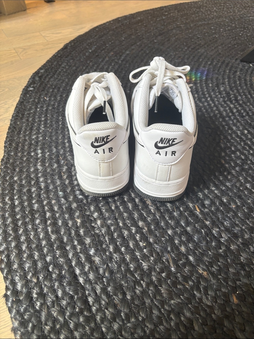 Nike White Low-Top Leather Sneakers with Black Swoosh - Picture 4 of 5